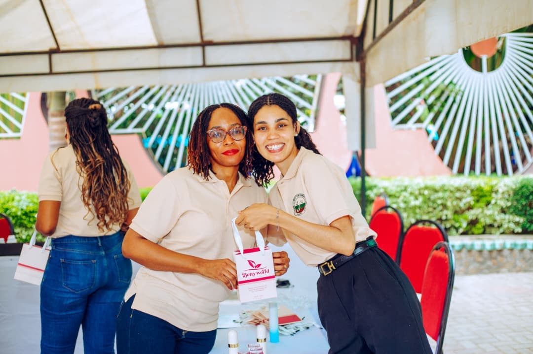 Dr. Elizabeth Consoli sharing a community event moment with a participant